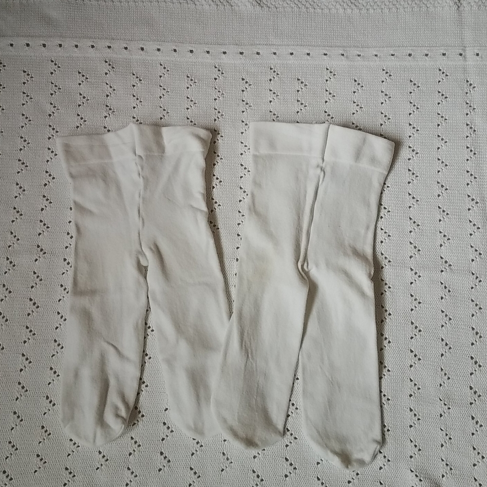 Warm white tights for baby girl